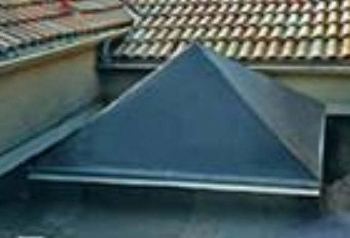 Square pyramid skylight with light gray shade.