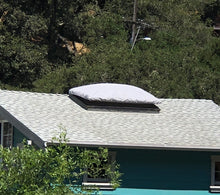 Custom gray shade on a domed skylight.