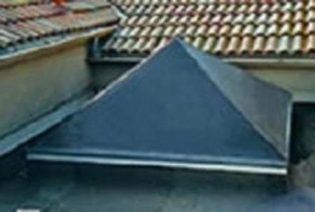Pyramid skylight with Fisher exterior solar light gray shade.